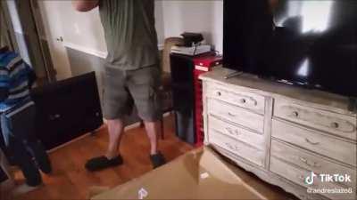 Parents shocked and do nothing when their kid with a hammer smashes their new TV