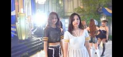 Mina circling Tzuyu.