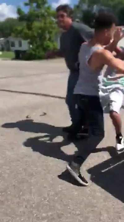 Guy in the red shorts came around acting like Billy the Badass and threatening this guy’s girl and baby then got his ass knocked ouuutttt.