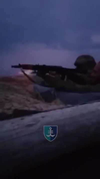 Ukrainian marines from the 35th Marine Brigade firing from their trench on the outskirts of the city of Kurakhove, Donetsk region.