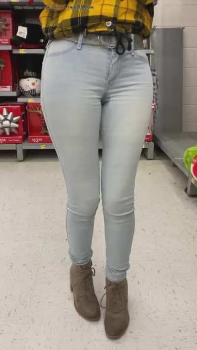 Girl pees her jeans in a store