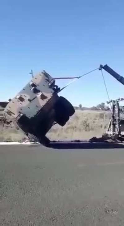 Tow truck driver has a big problem when vehicle gets away from him
