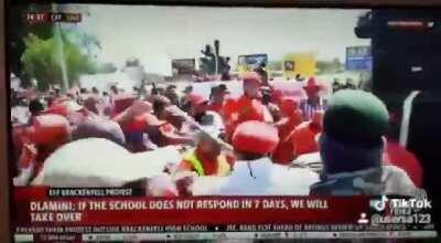 White guy gets assaulted for asking a black politician why his party hates white people.