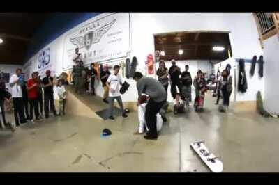 Skater hits head on concrete following a frontside flip attempt off a high drop