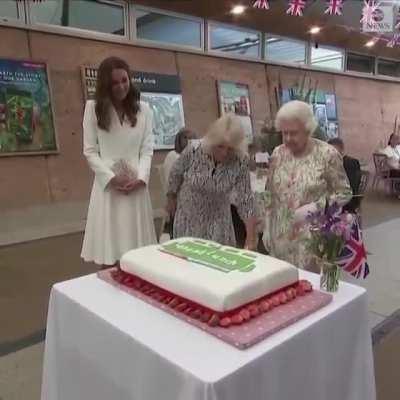 Queen Elizabeth II insisted on cutting a cake using a ceremonial Sword at an event on the sidelines of the G7 Summit