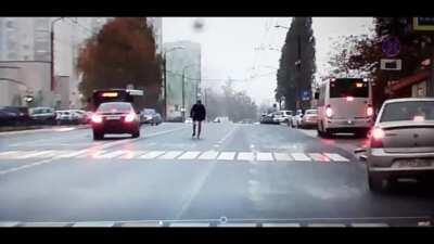 Man left stumbling after getting hit by car in Russia