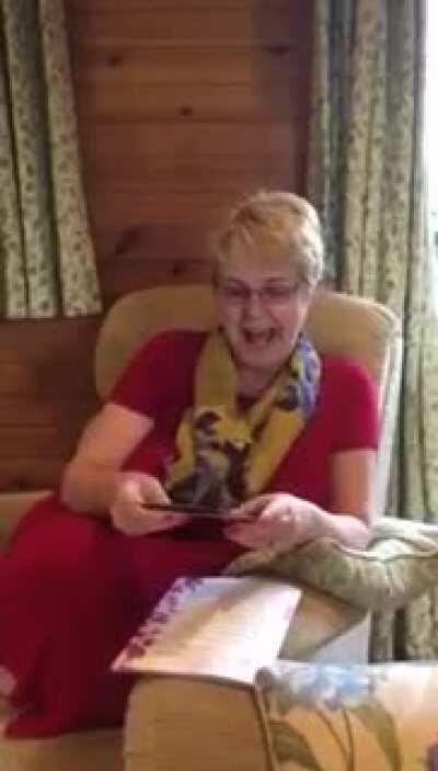 Woman Freaks out After Fake Butterfly Flies out of Card