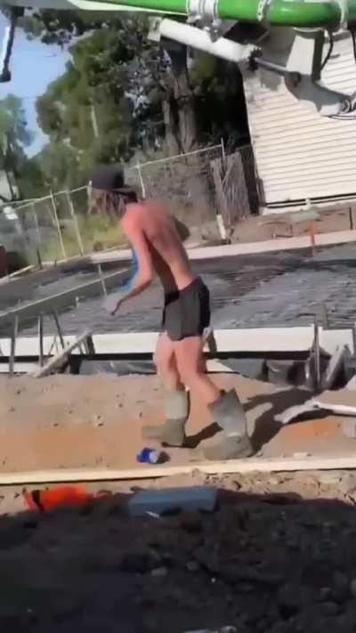 Using a shovel to puncture a paint can