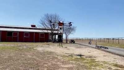 Parent of the year award goes to the dad flying his kid on a giant drone