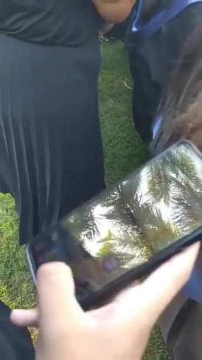 We’re at graduation and this guy’s playing Clash 💀