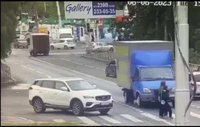 Girls passing the street, Truck doesn't stop and hits one of them with a side mirror (June 6, 2023.)