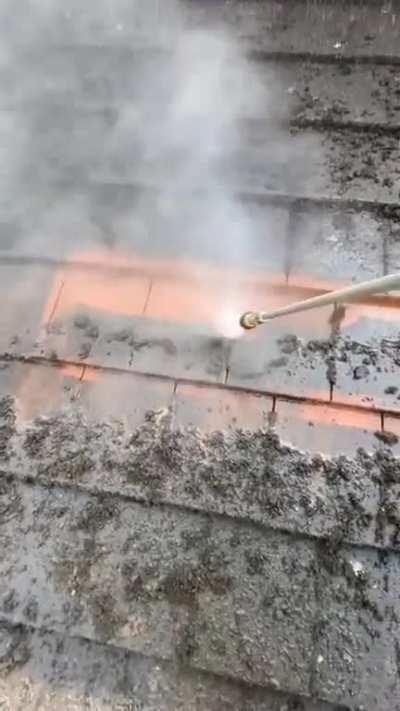 Power washing a dirty dirty roof!