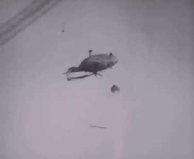 A Mi-8 Helicopter crashes over the core of the Chernobyl reactor in October in 1986