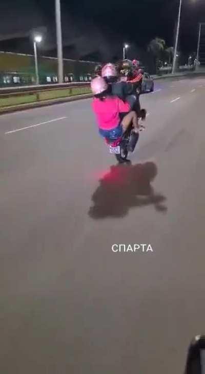 Showing off while riding a motorcycle