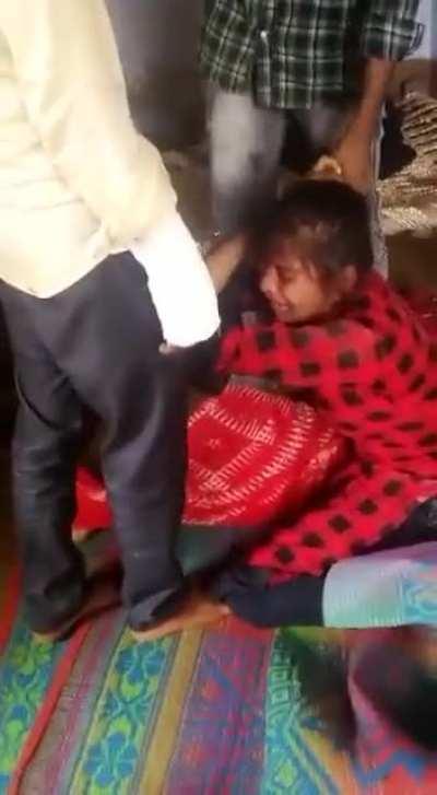 A woman in UP was brutally beaten up by her husband for dowry.