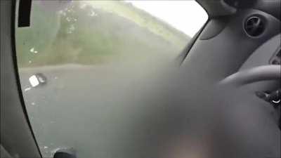 guy flips vehicle, gives a typical british reaction.