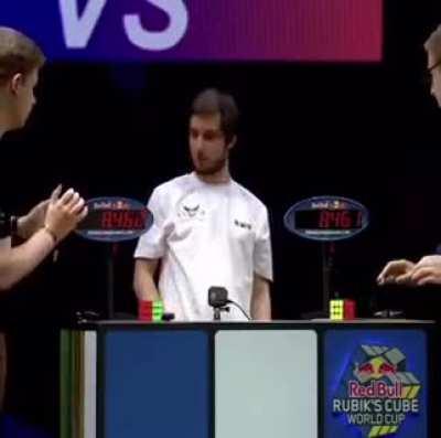 Guy loses Rubiks cube race by 0.001 seconds