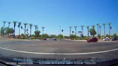 Slowest red light runner ever?