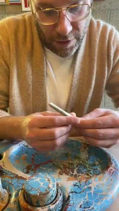 Seth Rogen shows off his new invention: an all-in-one rolling tray.