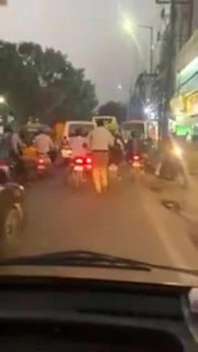 Hyderabad cop running for 2 km to help ambulance get through traffic