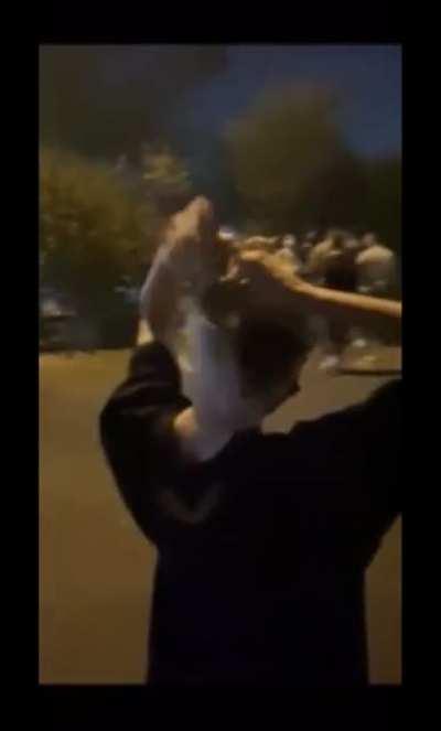A video from yesterday anti-Hijab protests in Iran showing Hadis Najafi (21) getting ready to stand to the security guards. Today Hadis was announced death by her family after being shot 6 bullets in her chest. Remember her name #HadisNajafi