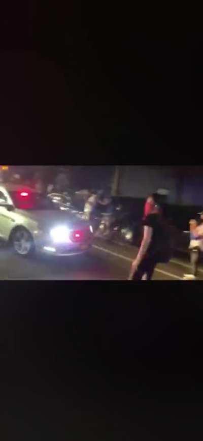 NYPD opens door on protester while driving away