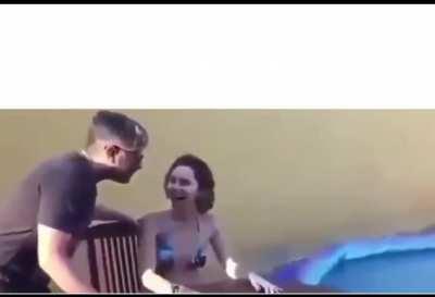 woman throw her laptop after some one com to her