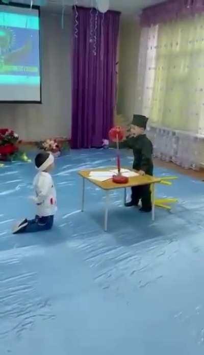 Nothing unusual, just for the 30th anniversary of Kazakhstan's independence, kids in kindergarten are playing a scene of interrogation and execution by Soviet soldiers of a proud Kazakh student. Apparently, the modern interpretation of the 