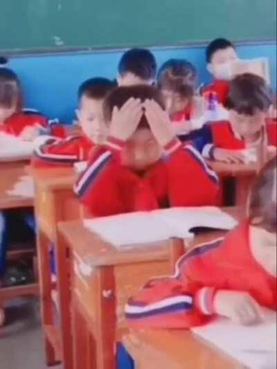 Qult member learning about how government works.