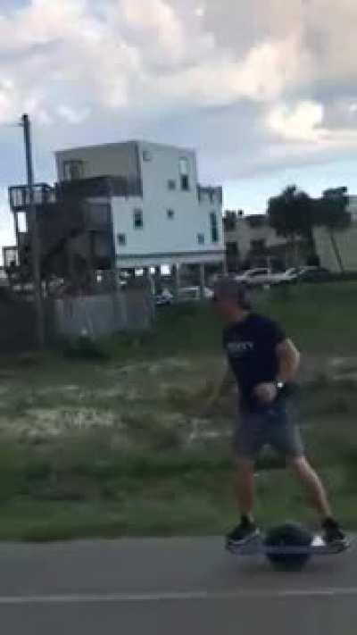 Going super fast on a OneWheel while drinking a beer