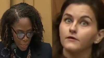 Who was the woman in blue behind Stacey Plaskett during her speech to Congress?