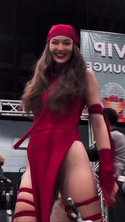 In red cosplay costume