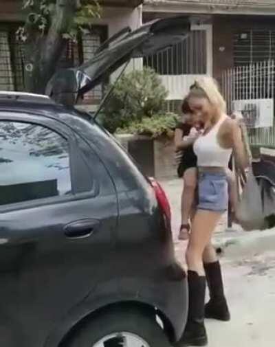 With both hands full...