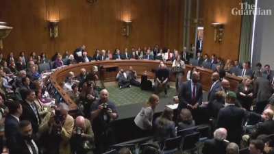 RFK Jr. jumps out of his fucking chair as protesters disrupt committee hearing