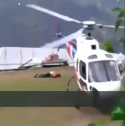 Helicopter Turns Man's Head Into Mist