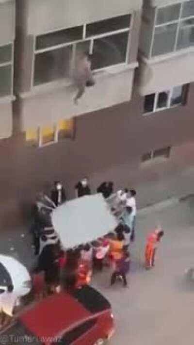 Group saves a man from burning apartment.