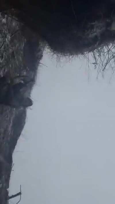 Russian soldier almost kills his comrade with the backblast from a rocket launcher.