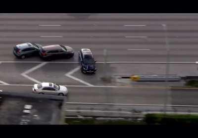 Crazy accident resulting from high speed police chase