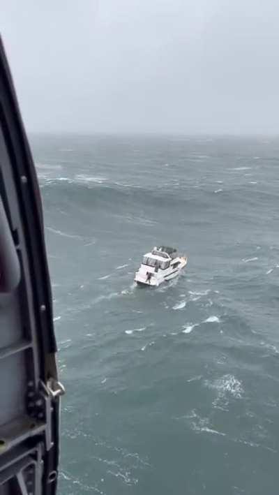 USCG making a gnarly rescue from HH-60J. All survived.