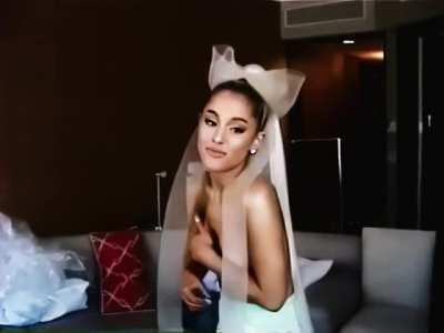 Ariana Grande topless.