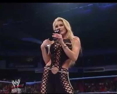 Torrie Wilson accepts Sable’s challenge to a bikini contest (2003)