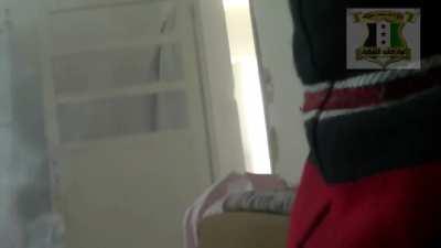 FSA fighter uses a PKM from the hip in close quarters fighting during the storming of Al-Amryia, Aleppo - 11/1/2012