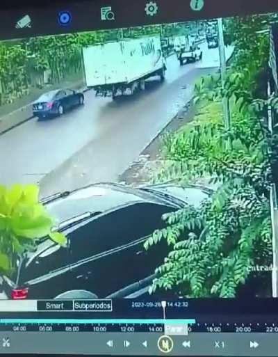 Motorclist hit by out of control truck