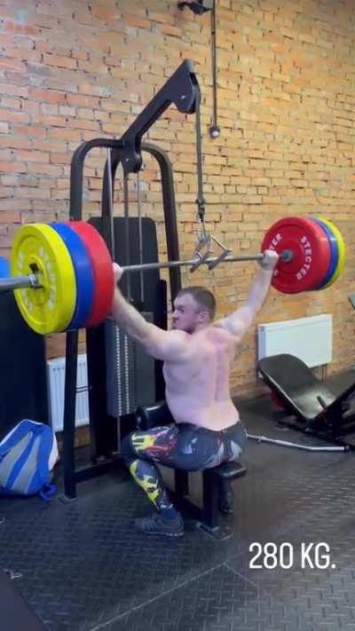 Using the lat pulldown machine with excessively heavy weight