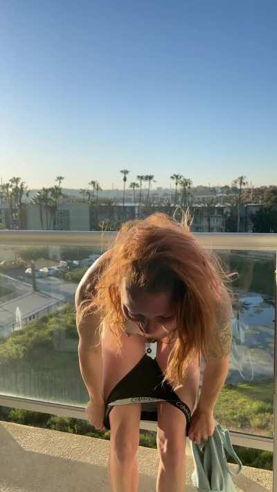I was dared to get naked above a very busy park in the hotel I stayed at. [GIF]