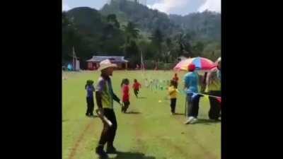 Kids trying to run relay