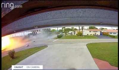 Plane crashes into car in the suburbs