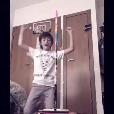 This kid stacked 8 markers together, flipped it, landed upright