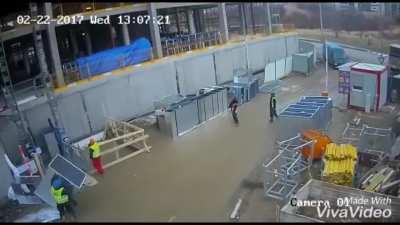 Crane drops its load at a construction site