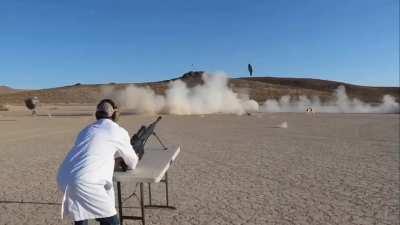 Shooting an oxygen tank inside a safe with a 50 BMG API round